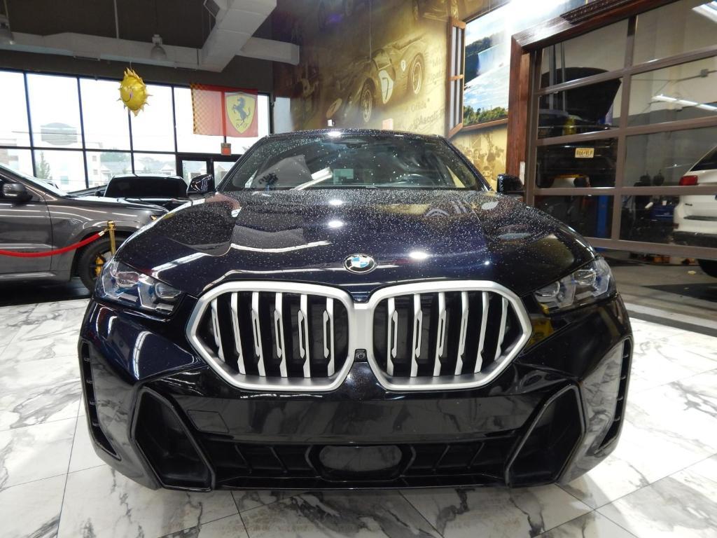 used 2025 BMW X6 car, priced at $59,995