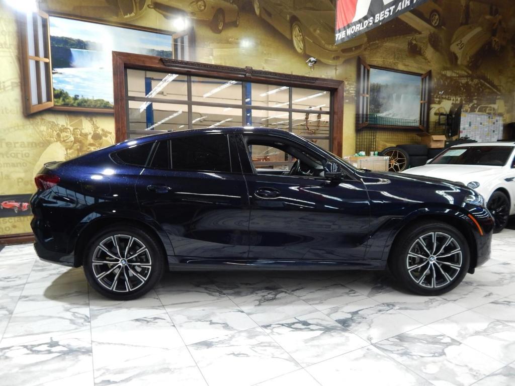 used 2025 BMW X6 car, priced at $59,995
