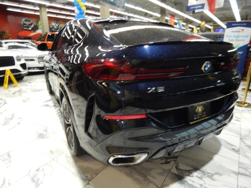 used 2025 BMW X6 car, priced at $59,995