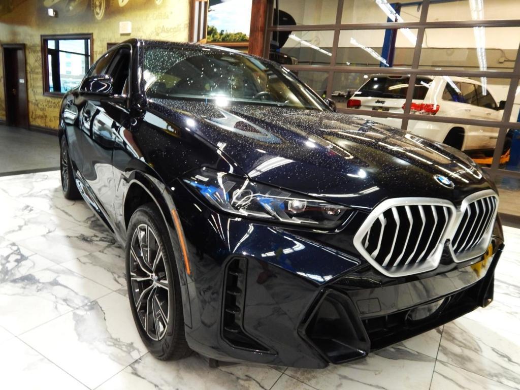 used 2025 BMW X6 car, priced at $59,995
