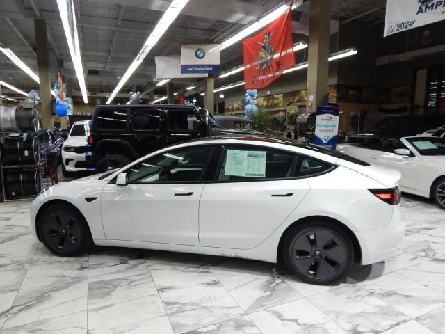 used 2022 Tesla Model 3 car, priced at $28,995