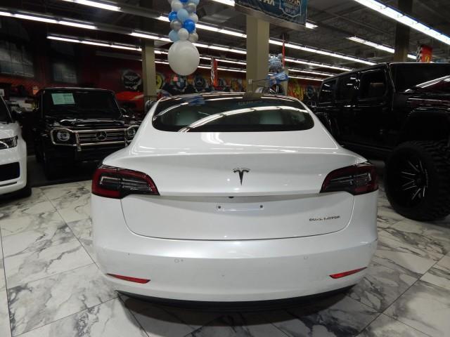 used 2022 Tesla Model 3 car, priced at $28,995