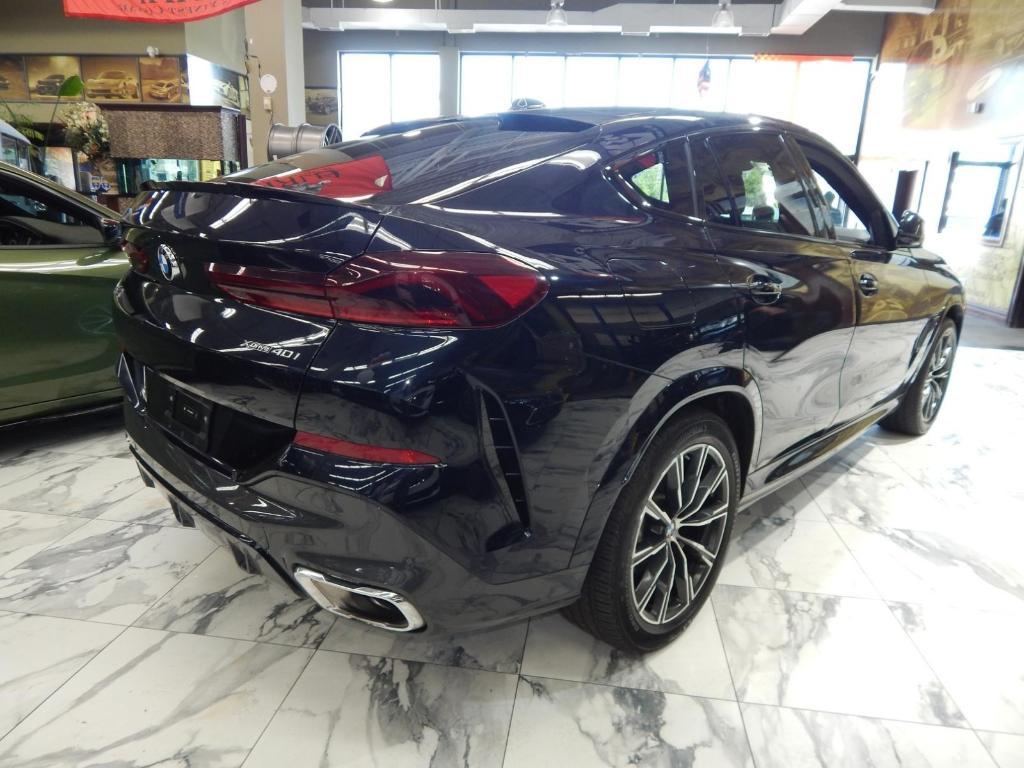 used 2025 BMW X6 car, priced at $51,695