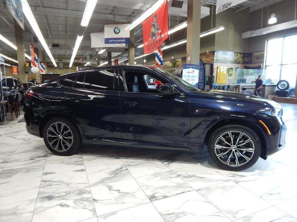 used 2025 BMW X6 car, priced at $51,695