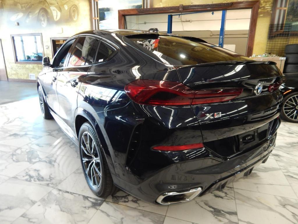 used 2025 BMW X6 car, priced at $51,695