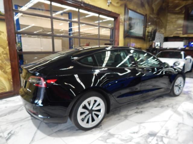 used 2022 Tesla Model 3 car, priced at $30,995