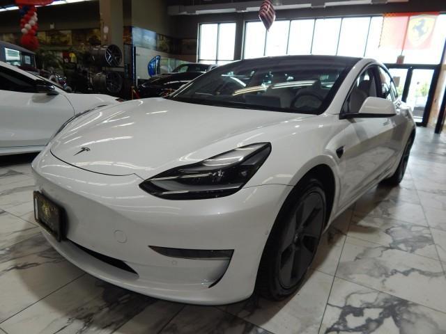 used 2022 Tesla Model 3 car, priced at $27,988