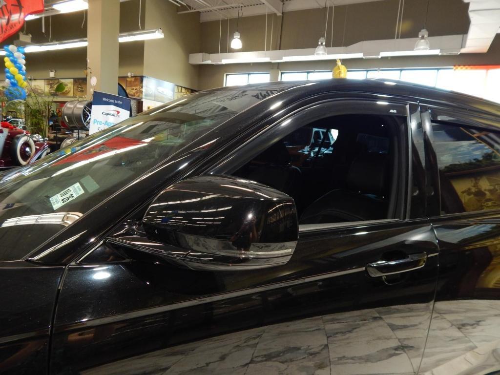 used 2021 Jeep Grand Cherokee L car, priced at $20,995