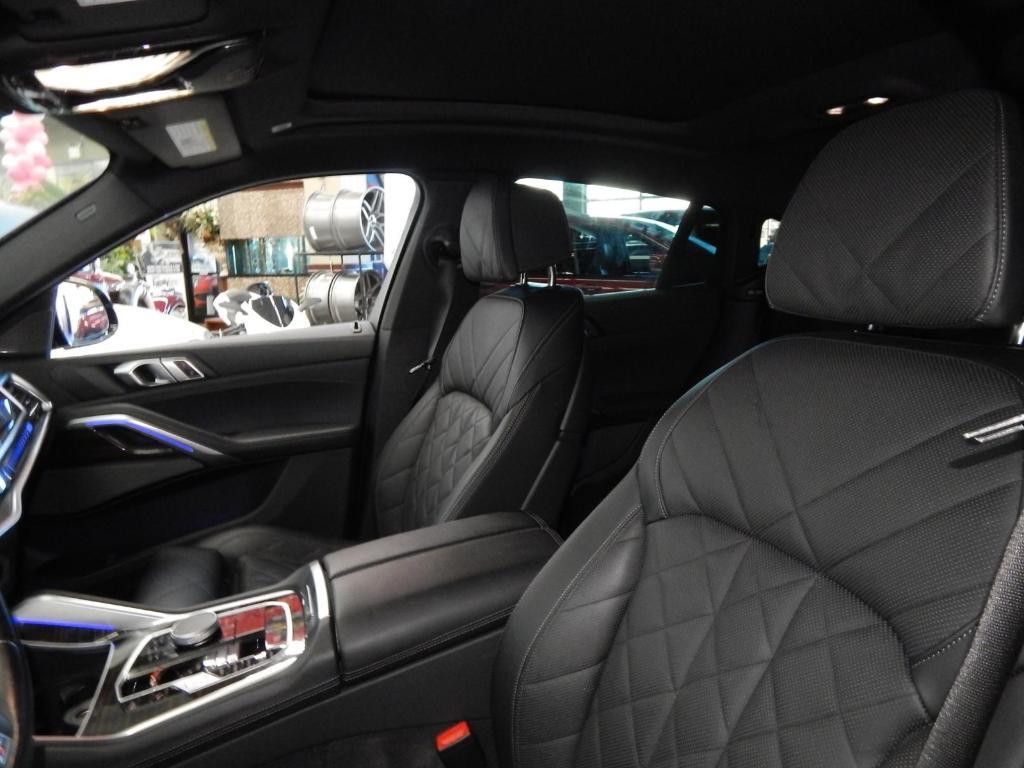 used 2025 BMW X6 car, priced at $58,995
