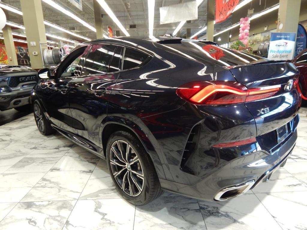 used 2025 BMW X6 car, priced at $58,995