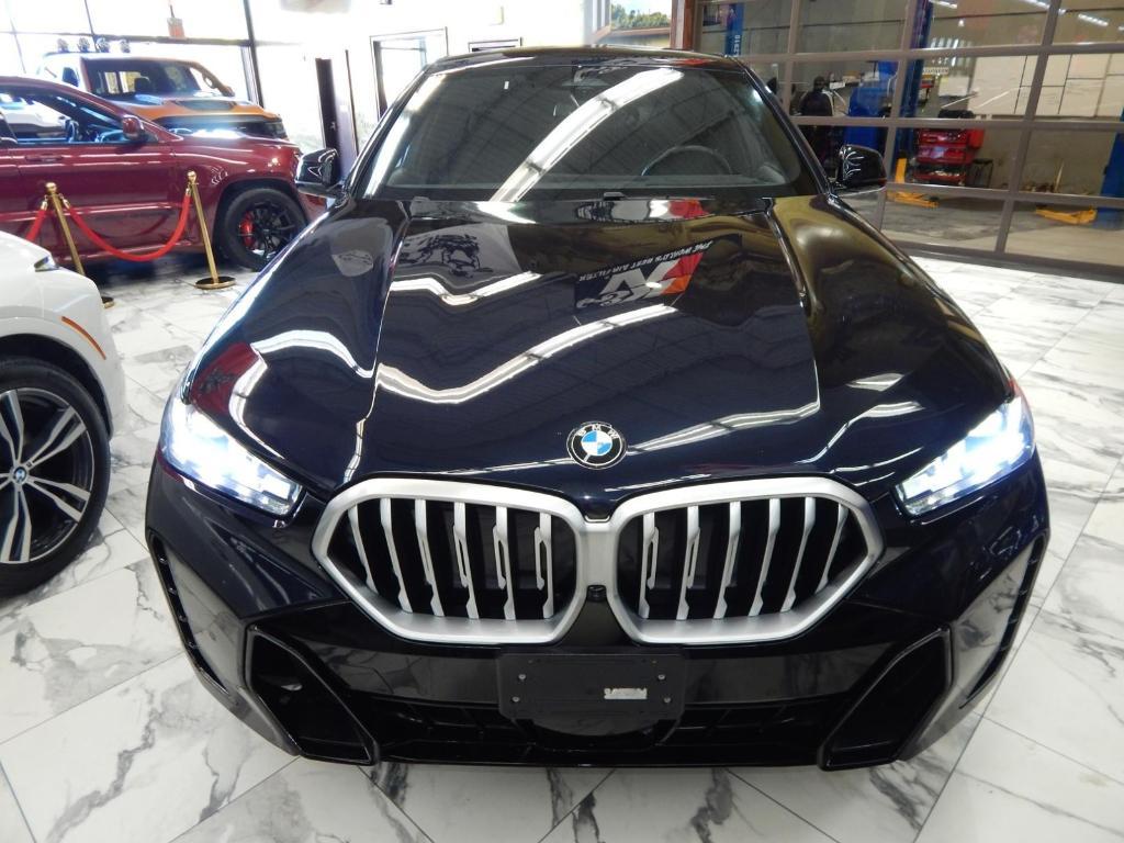 used 2025 BMW X6 car, priced at $58,995