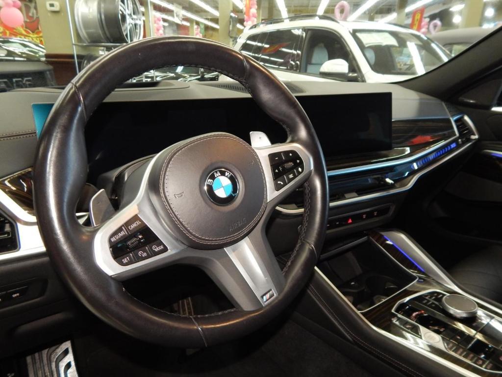 used 2025 BMW X6 car, priced at $58,995