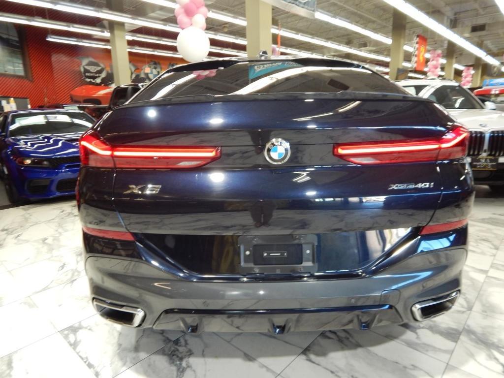 used 2025 BMW X6 car, priced at $58,995