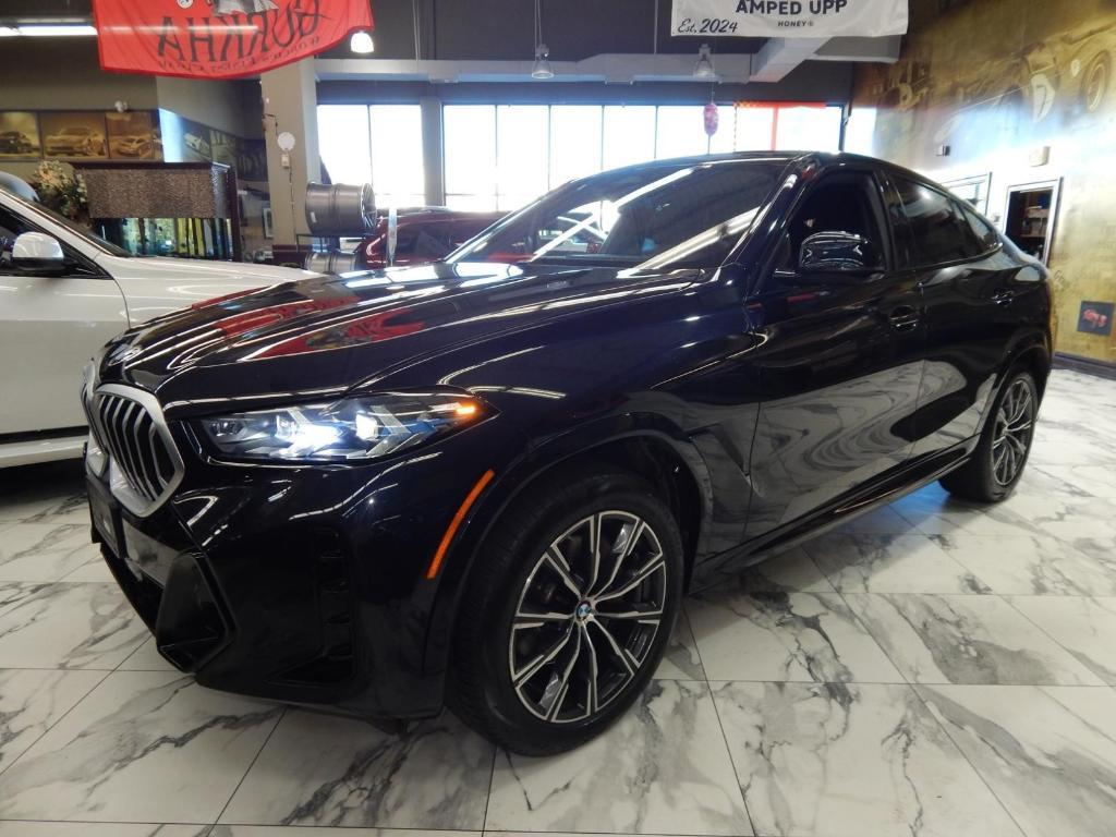 used 2025 BMW X6 car, priced at $58,995