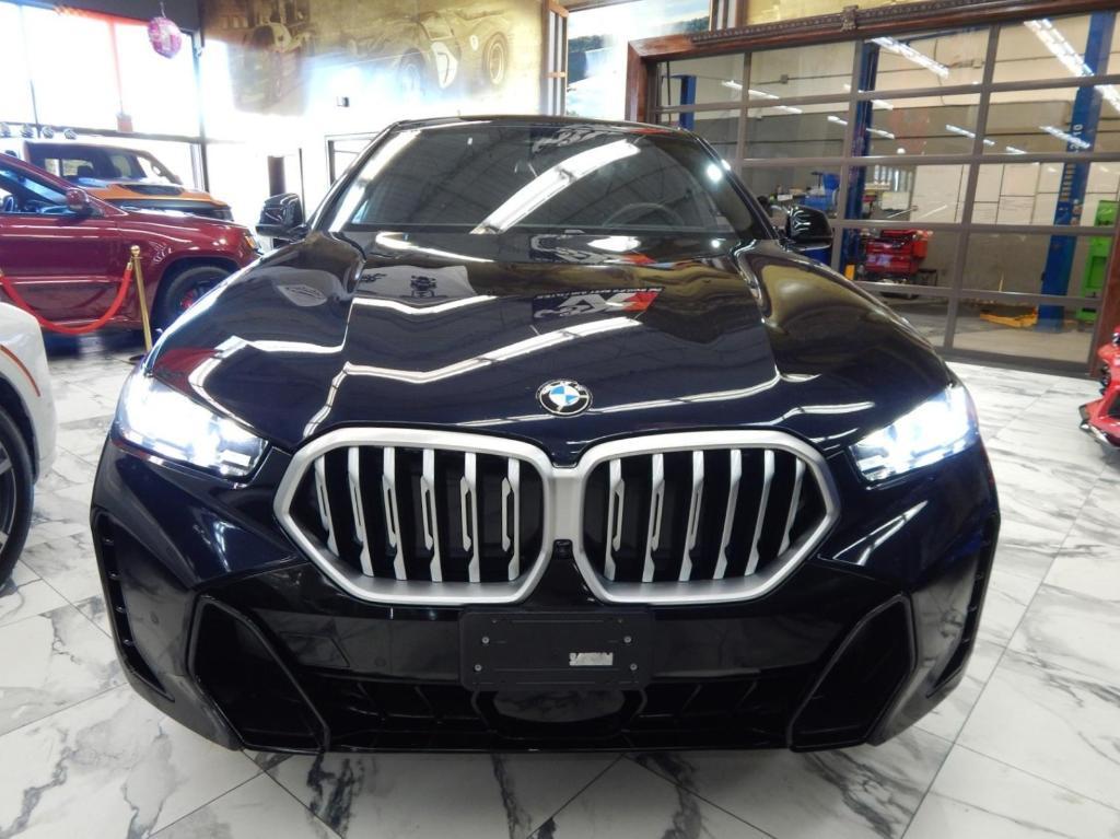 used 2025 BMW X6 car, priced at $58,995