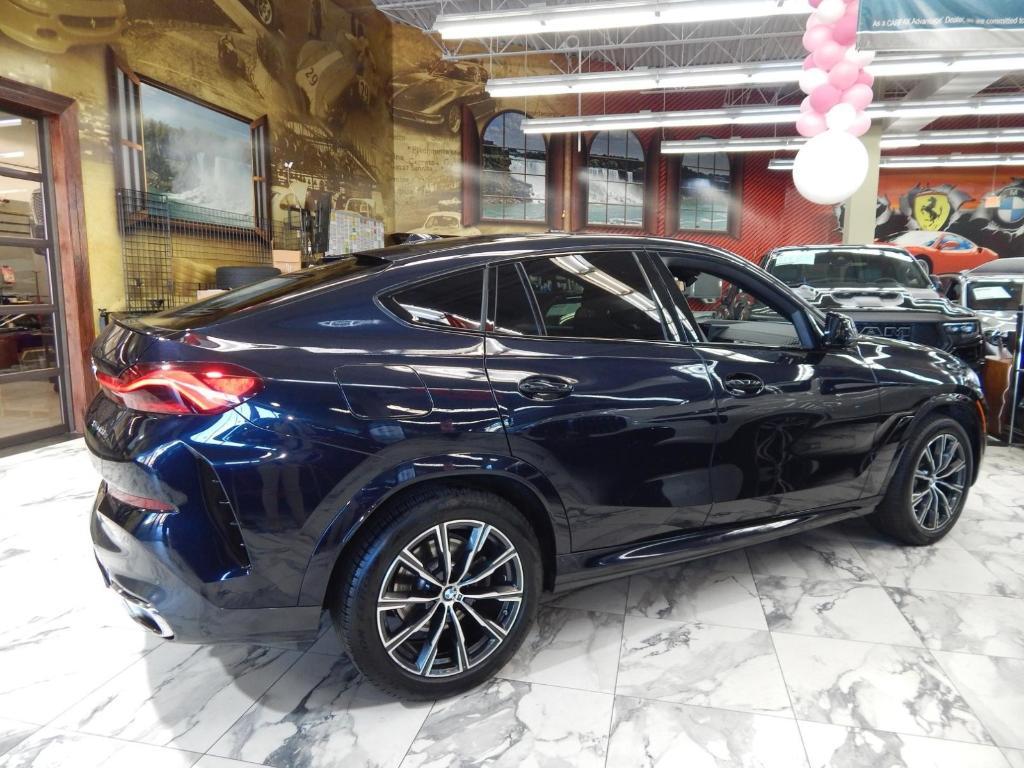 used 2025 BMW X6 car, priced at $58,995