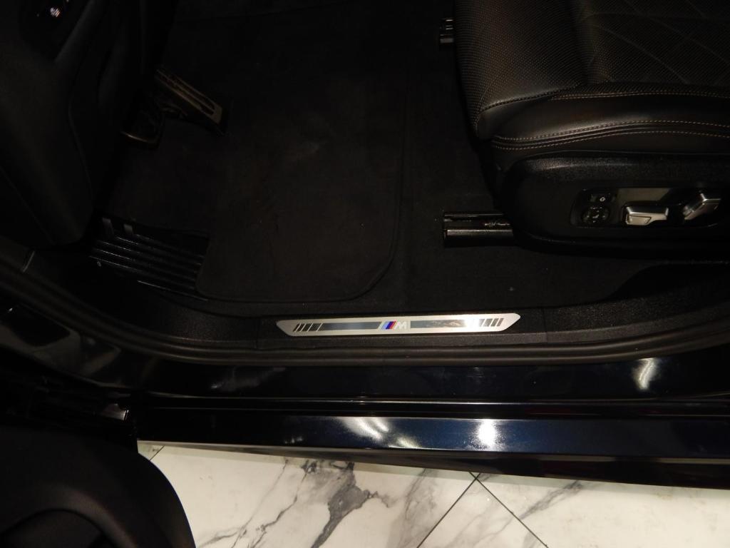 used 2025 BMW X6 car, priced at $58,995