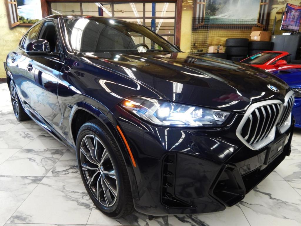 used 2025 BMW X6 car, priced at $58,995