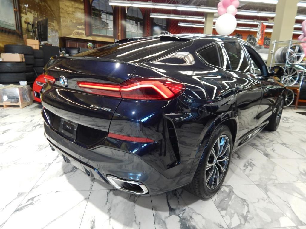 used 2025 BMW X6 car, priced at $58,995