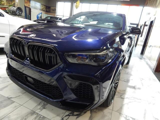 used 2022 BMW X6 M car, priced at $79,985