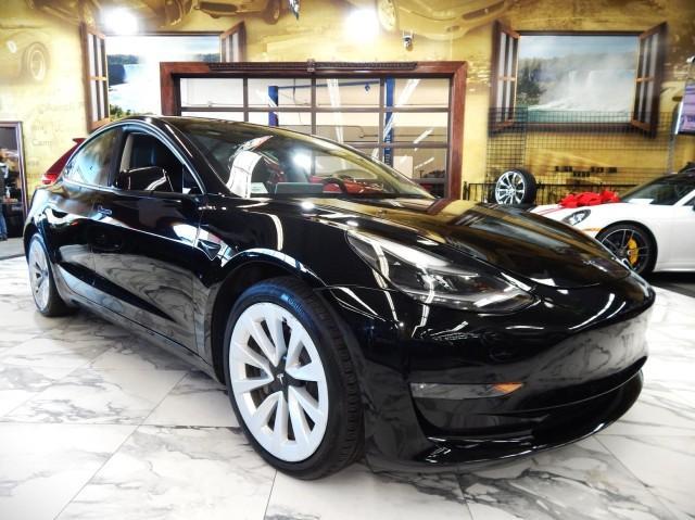 used 2022 Tesla Model 3 car, priced at $26,421