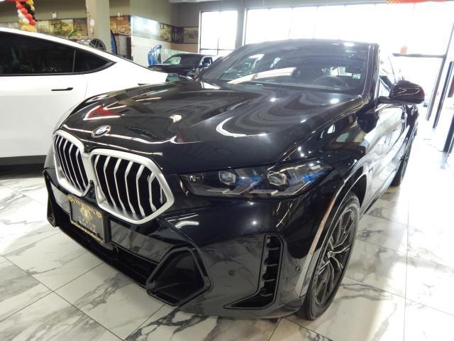 used 2024 BMW X6 car, priced at $56,821