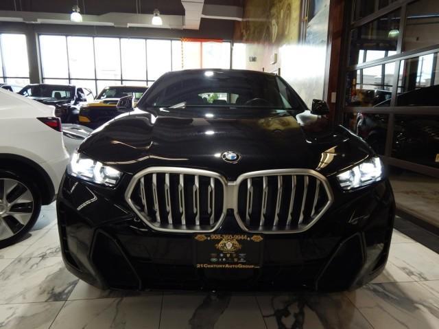 used 2024 BMW X6 car, priced at $56,821