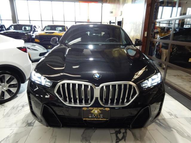 used 2024 BMW X6 car, priced at $56,821