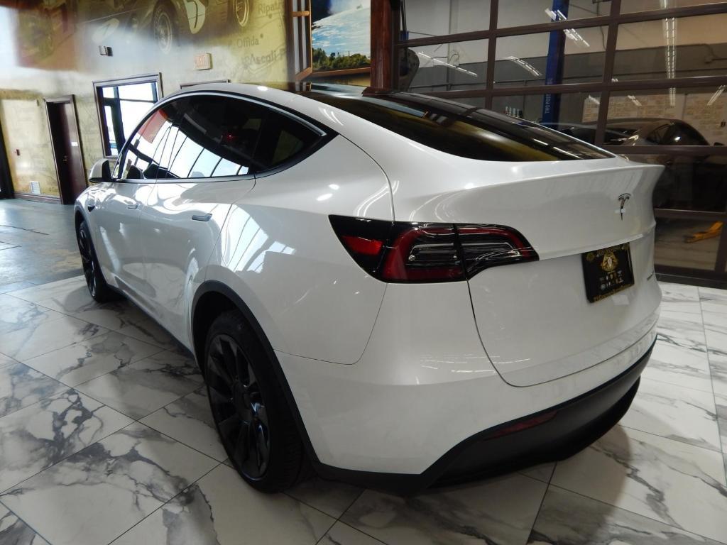used 2023 Tesla Model Y car, priced at $27,995