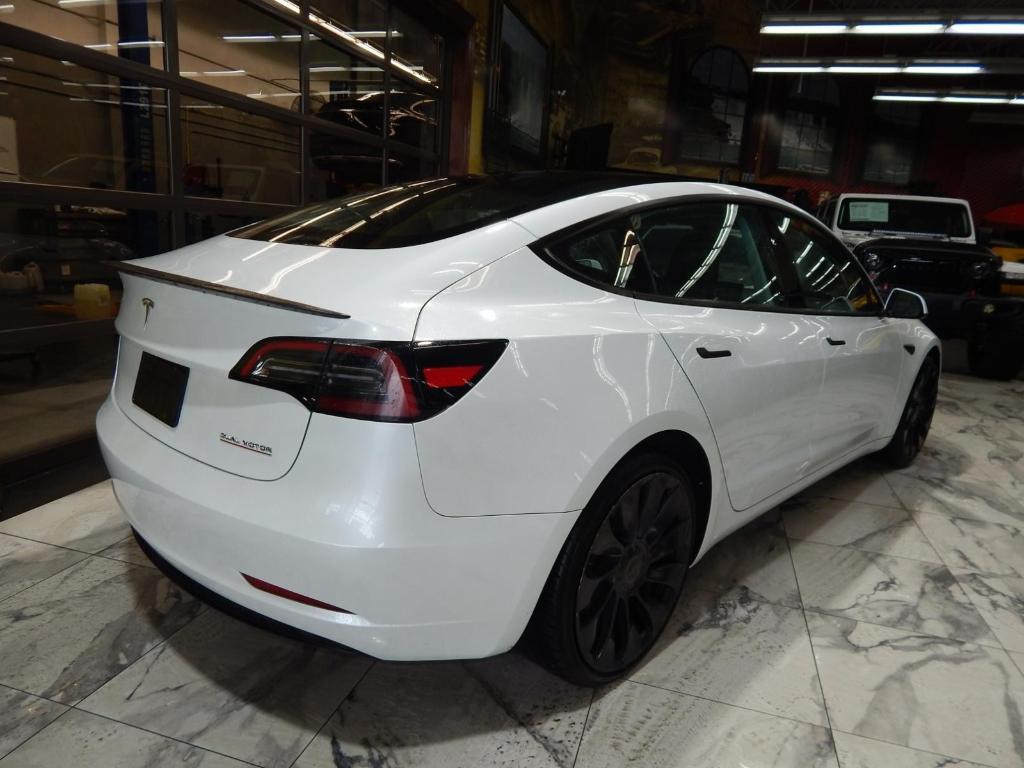 used 2023 Tesla Model 3 car, priced at $26,895