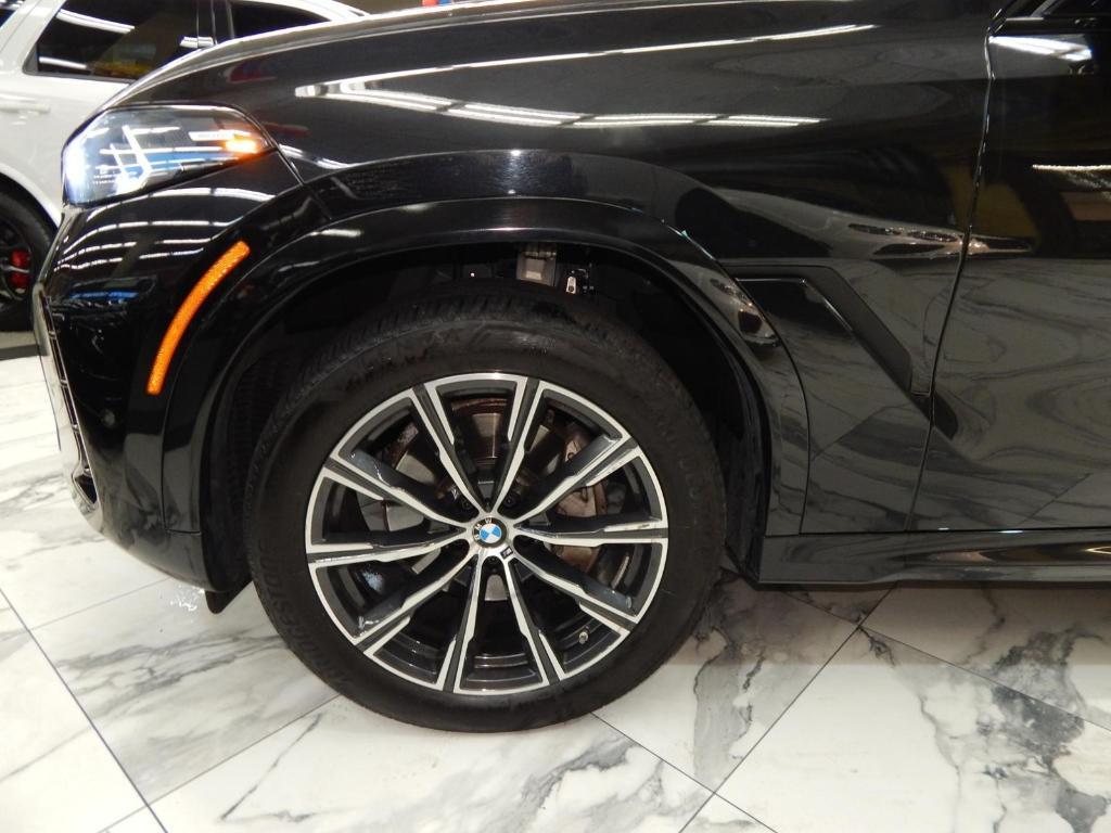 used 2025 BMW X6 car, priced at $58,995