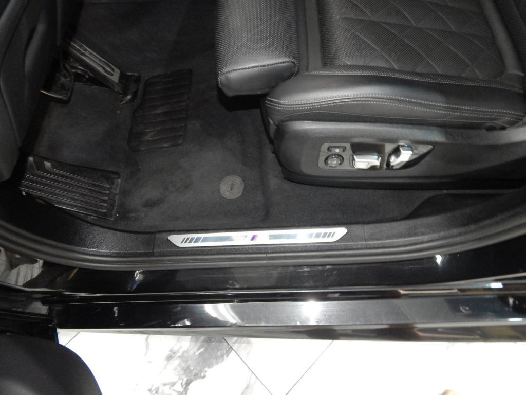 used 2025 BMW X6 car, priced at $58,995