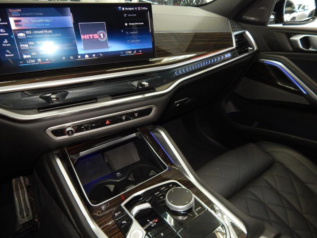used 2025 BMW X6 car, priced at $58,995
