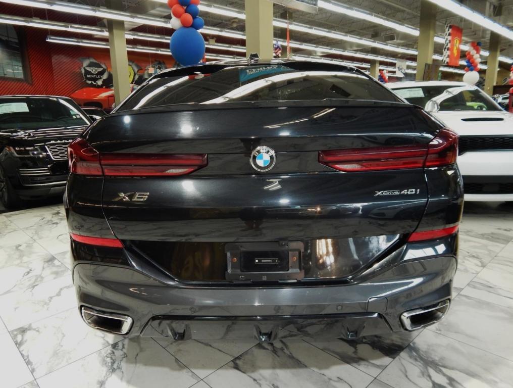 used 2025 BMW X6 car, priced at $58,995