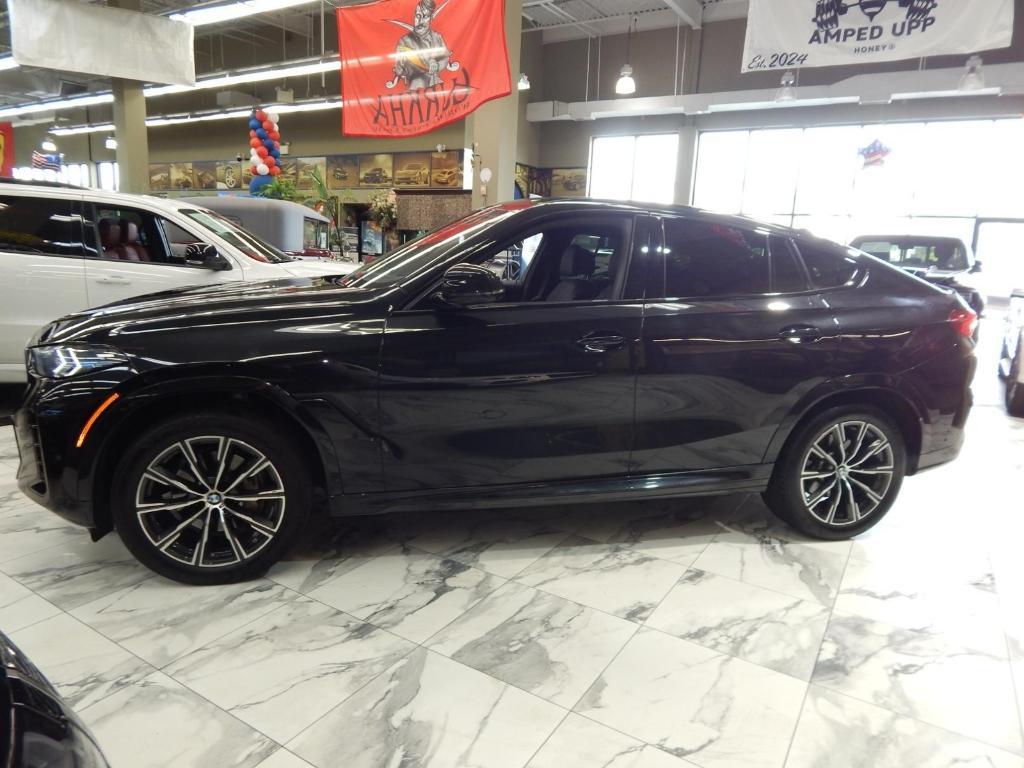 used 2025 BMW X6 car, priced at $58,995