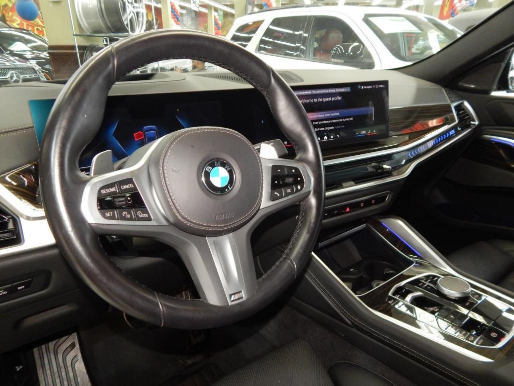 used 2025 BMW X6 car, priced at $58,995