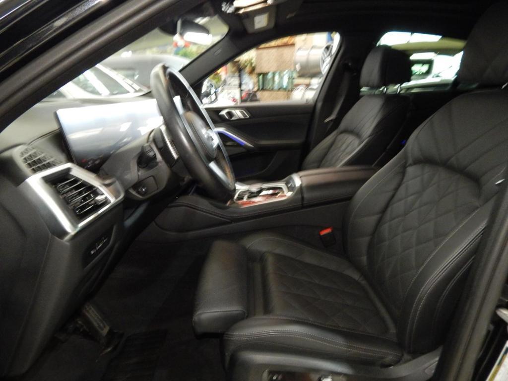 used 2025 BMW X6 car, priced at $58,995