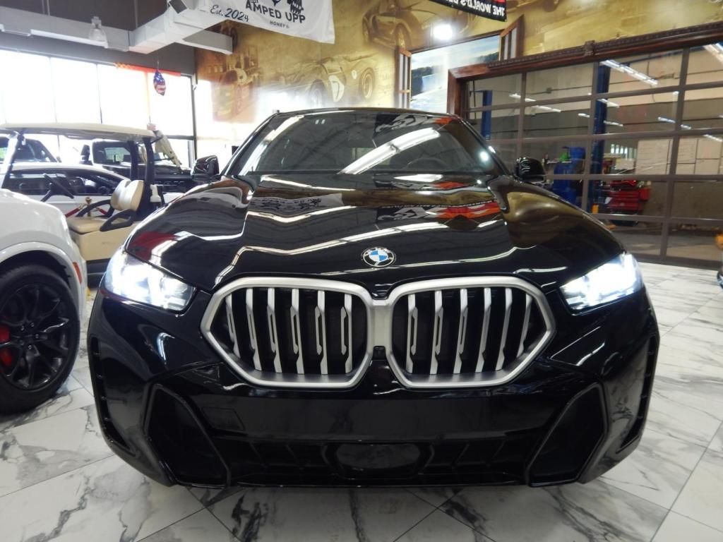 used 2025 BMW X6 car, priced at $58,995