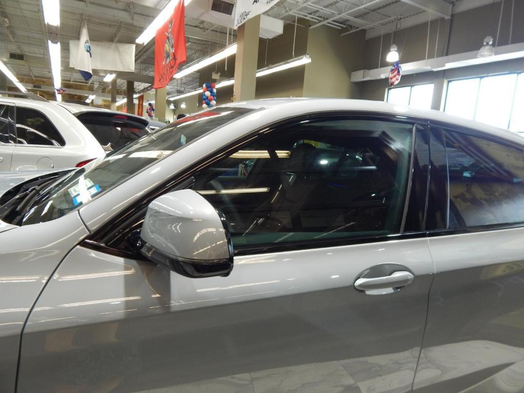 used 2025 BMW X4 car, priced at $44,688