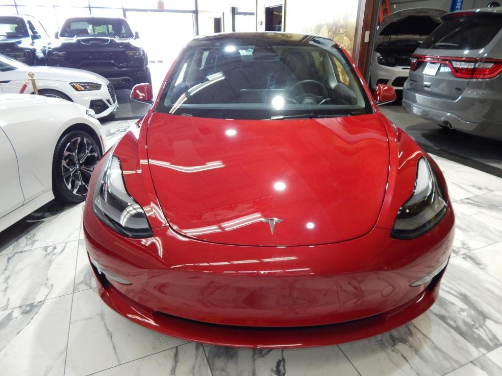 used 2023 Tesla Model 3 car, priced at $33,795
