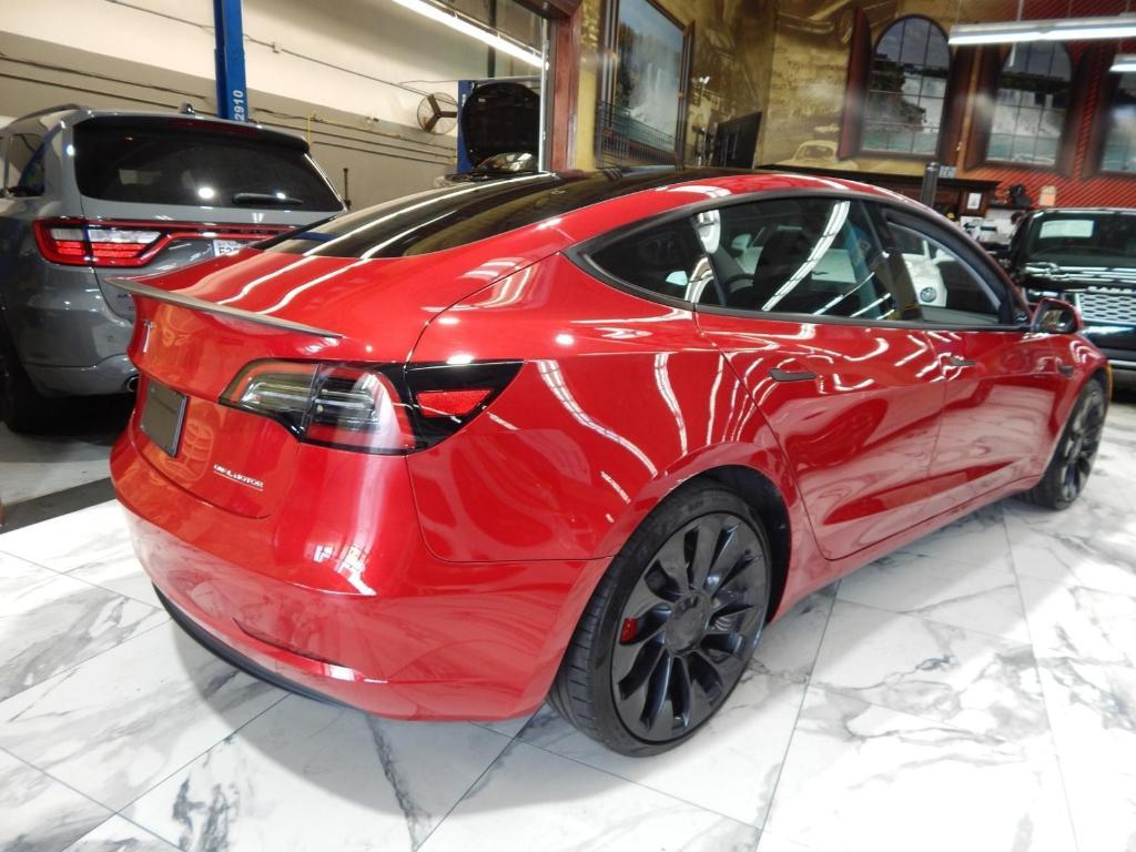 used 2023 Tesla Model 3 car, priced at $33,795