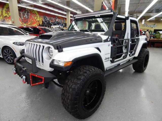 used 2021 Jeep Wrangler Unlimited car, priced at $29,921