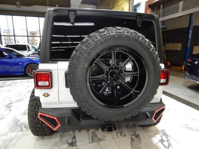 used 2021 Jeep Wrangler Unlimited car, priced at $29,921