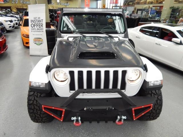 used 2021 Jeep Wrangler Unlimited car, priced at $29,921