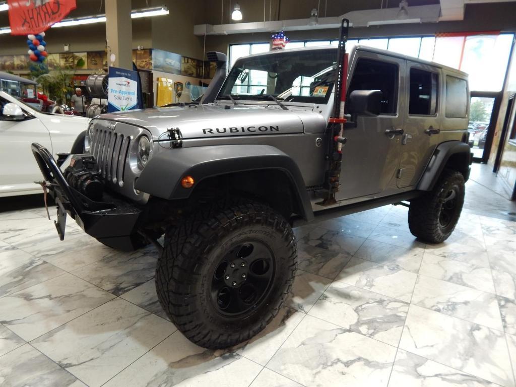 used 2015 Jeep Wrangler Unlimited car, priced at $18,995