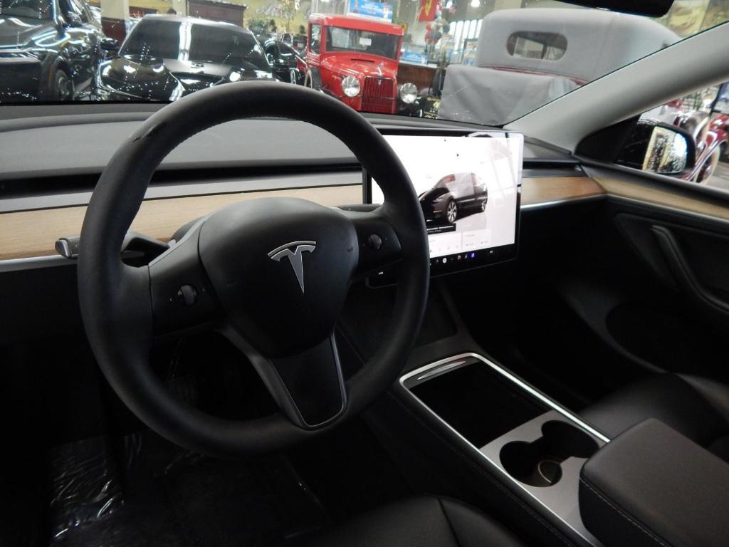 used 2024 Tesla Model Y car, priced at $27,987