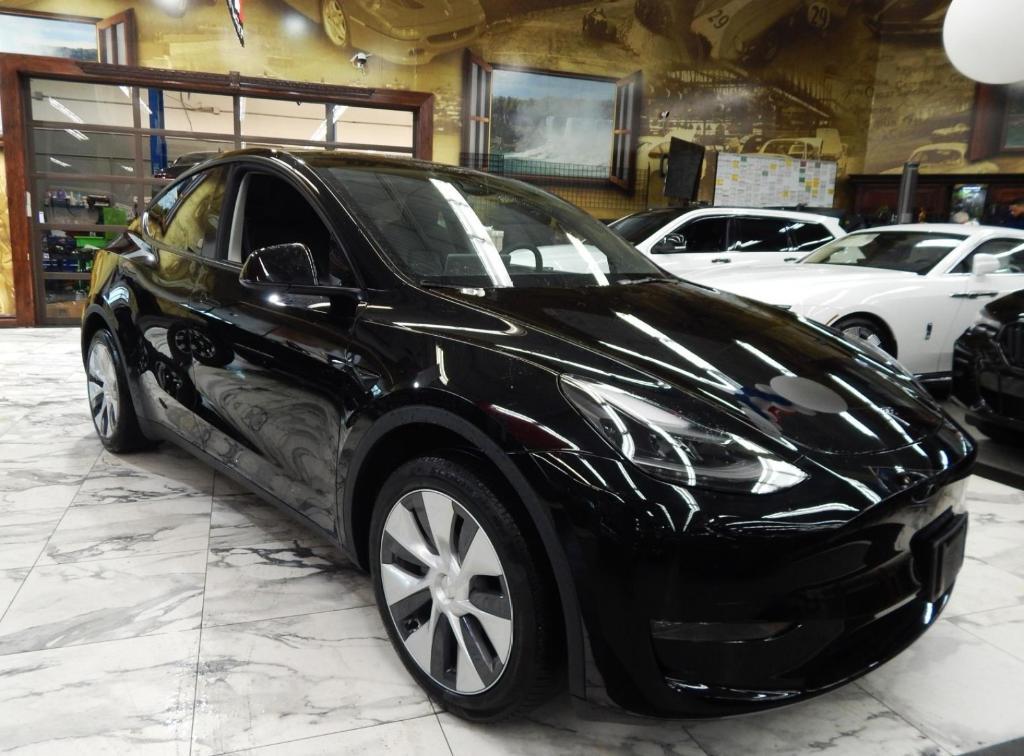 used 2024 Tesla Model Y car, priced at $27,987
