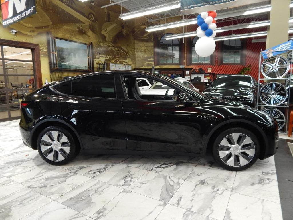 used 2024 Tesla Model Y car, priced at $27,987