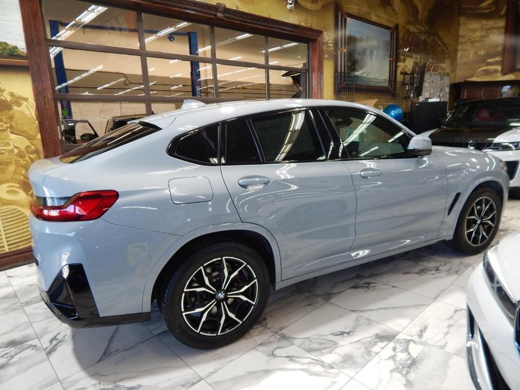 used 2023 BMW X4 car, priced at $35,885