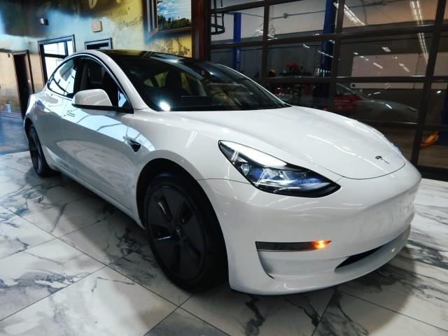 used 2023 Tesla Model 3 car, priced at $28,521